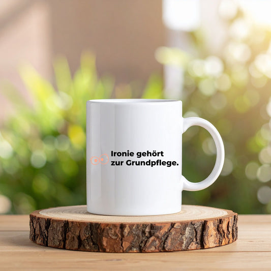 😏Pflegehumor Tasse - "Ironie gehört zur Grundpflege"